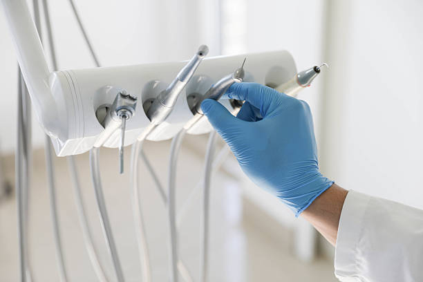 Professional Wisdom Tooth Removal technician working in Garden City South, NY